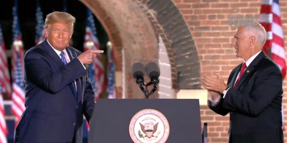 Vice President Mike Pence is joined by President Donald Trump after speaking from Fort McHenry in Baltimore, Maryland during the Republican National Convention.