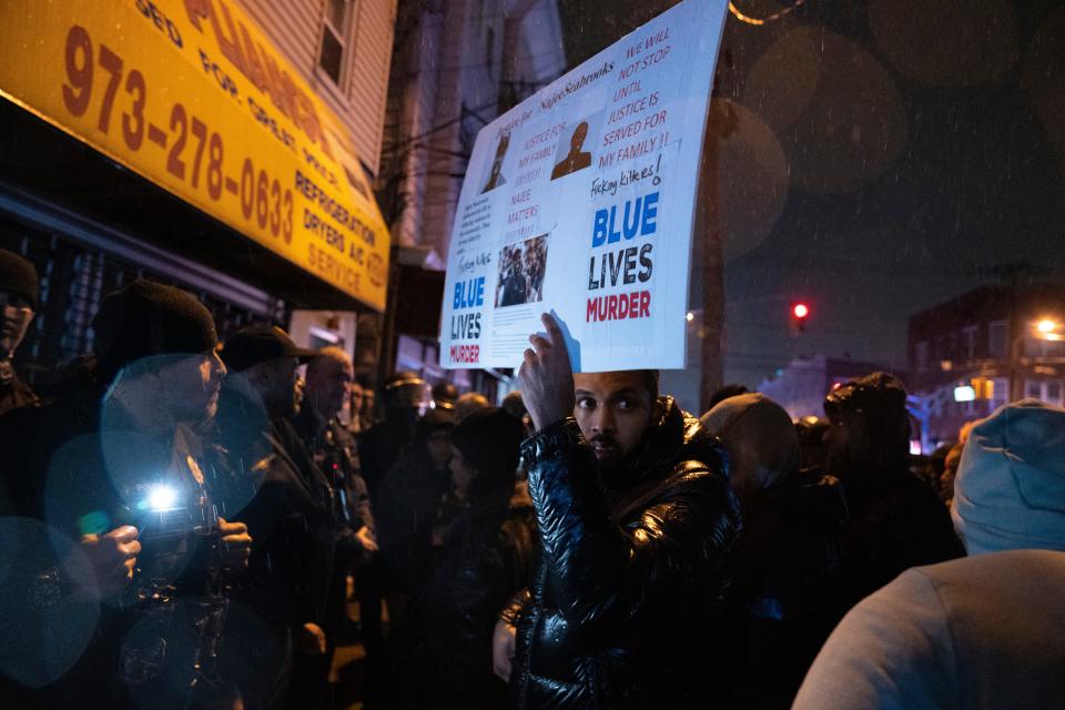 Protesters demanding justice for Najee Seabrooks and Paterson police on Grand Street in Paterson on Friday, March 10, 2023. Seabrooks, a member of the violence intervention group the Paterson Healing Collective, was fatally shot by Paterson police after a standoff while he was barricaded inside his home.