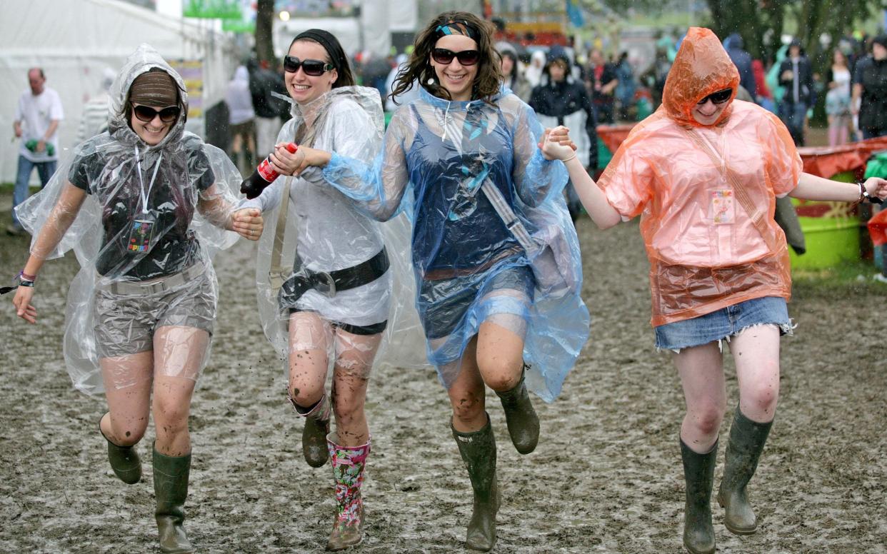 Festival-goers have experienced some famously muddy conditions at Glastonbury in previous years - but how will the 2017 event compare? - PA