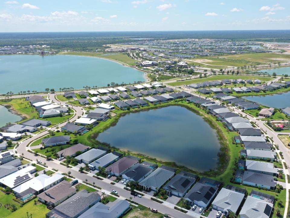 Small lakes around the neighborhood are designed to catch water and protect houses from flooding.