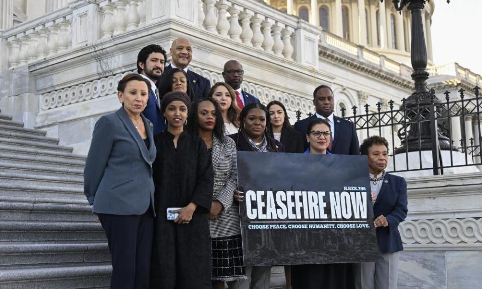 Democratic members of Congress with a sign demanding a ceasefire in the Israel-Hamas war.