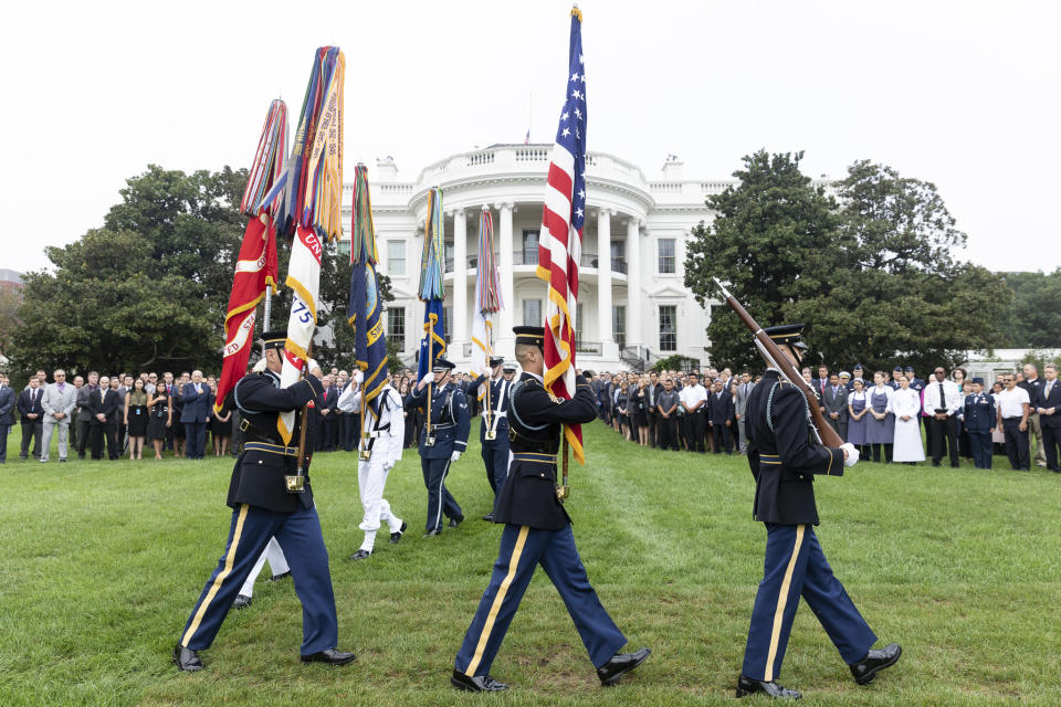 <p>White House staff gather for a moment of silence on the South Lawn of the White House on Sept. 11, 2018, in remembrance of those lost on September 11, 2001. (Photo: Stephanie Chasez/White House) </p>