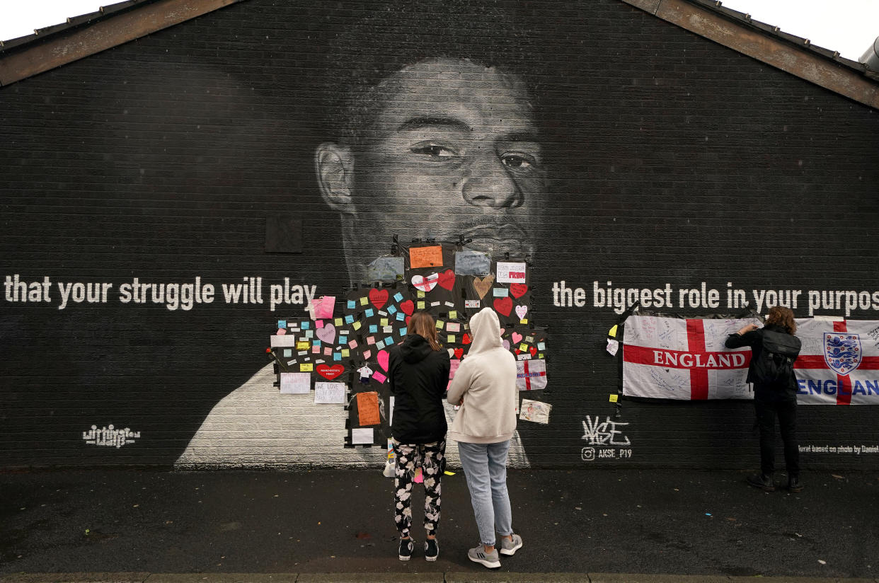 Messages of support that were placed on top of bin liners that were taped over offensive wording on the mural of Manchester United striker and England player Marcus Rashford on the wall of the Coffee House Cafe on Copson Street, Withington, which appeared vandalised the morning after the England football team lost the UEFA Euro 2021 final. Picture date: Monday July 12, 2021.