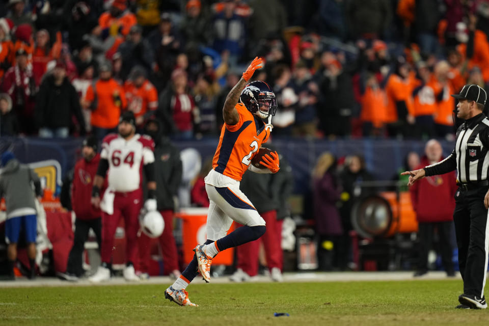 Denver Broncos cornerback Pat Surtain II (2) celebrates his interception against the Arizona Cardinals during the second half of an NFL football game, Sunday, Dec. 18, 2022, in Denver. The Broncos defeated the Cardinals 24-15. (AP Photo/Jack Dempsey)