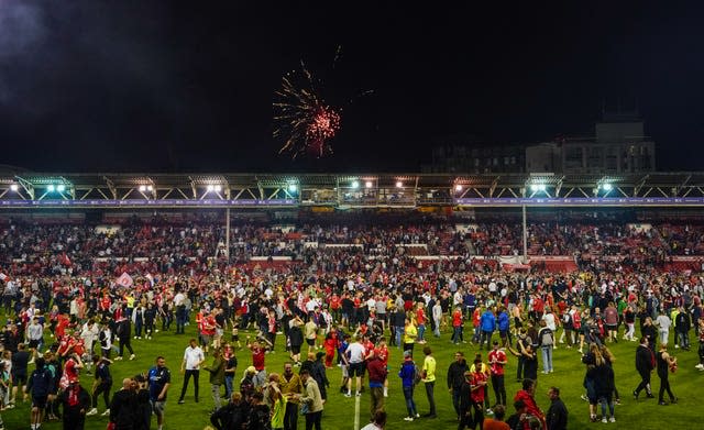 Nottingham Forest fans invade the pitch after they won their Championship play-off semi-final against Sheffield United 