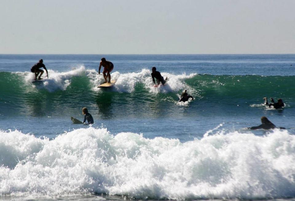 Veteran surfers crowd the waves at Windansea Beach off San Diego’s Pacific coastline.