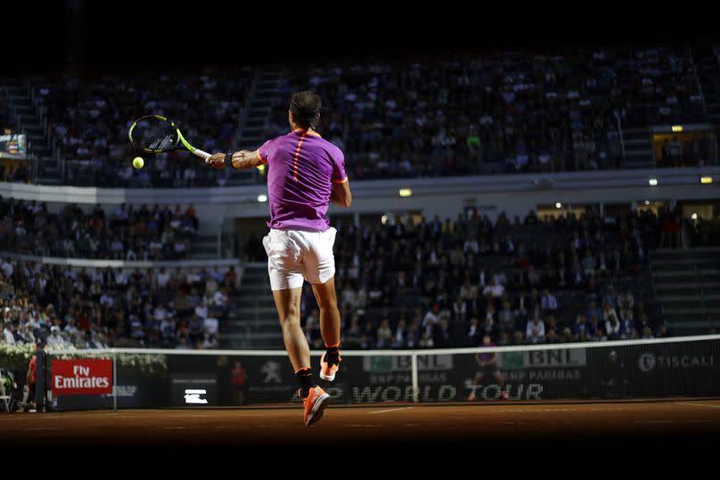 Spain's Rafa Nadal returns the ball during his match against Jack Sock of the United States during their match at the Italian Open tennis tournament, in Rome.