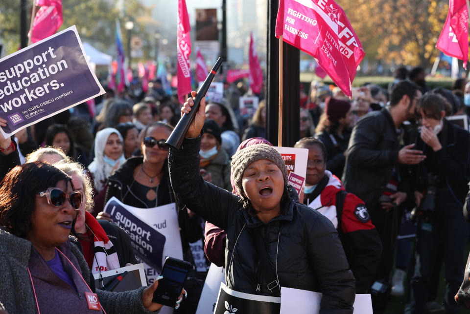 Members of CUPE education workers and other supporters amass at Queens Park to protest a day after the Provincial Government enacted the Not Withstanding Clause of the Canadian Constitution to legislate a contract on the union