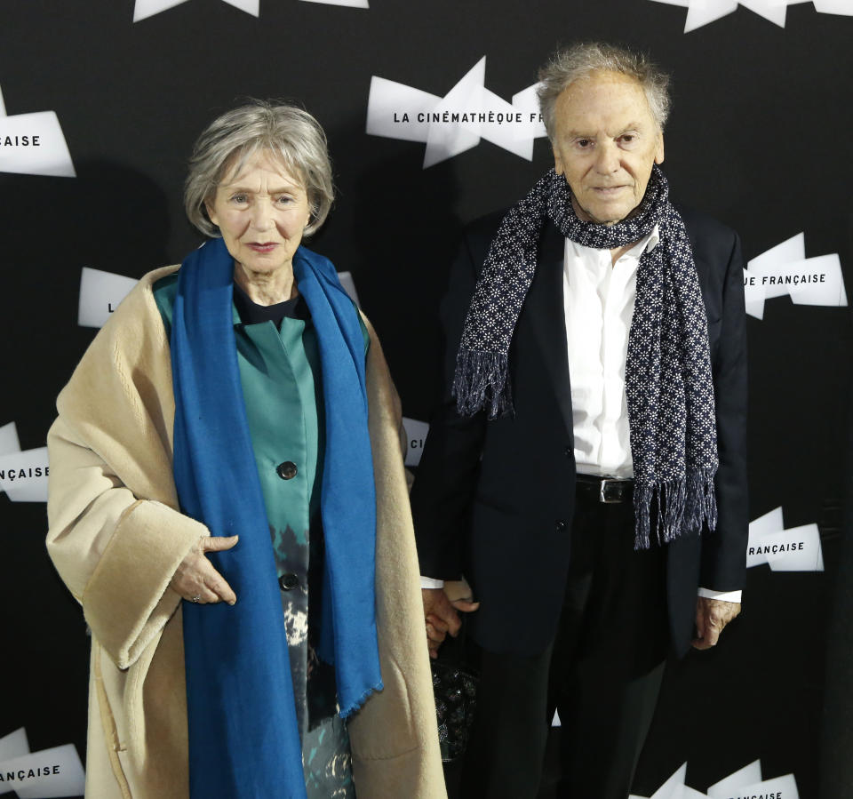 FILE - French actress Emanuelle Riva, left, and French actor Jean-Louis Trintignant, pose as they arrive for the pre-premier of the movie Love at the Cinematheque Francaise, in Paris, Monday, Oct. 15, 2012. French film legend and amateur racecar driver Jean-Louis Trintignant, who earned acclaim for the Oscar-winning "A Man and a Woman" a half a century ago and went on to portray the brutality of aging in his later years, has died at 91. (AP Photo/Michel Euler, File)