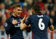 Britain Football Soccer - Bayern Munich v Atletico Madrid - UEFA Champions League Semi Final Second Leg - Allianz Arena, Munich - 3/5/16. Antoine Griezmann celebrates scoring the first goal for Atletico Madrid with Koke. Reuters / Michaela Rehle