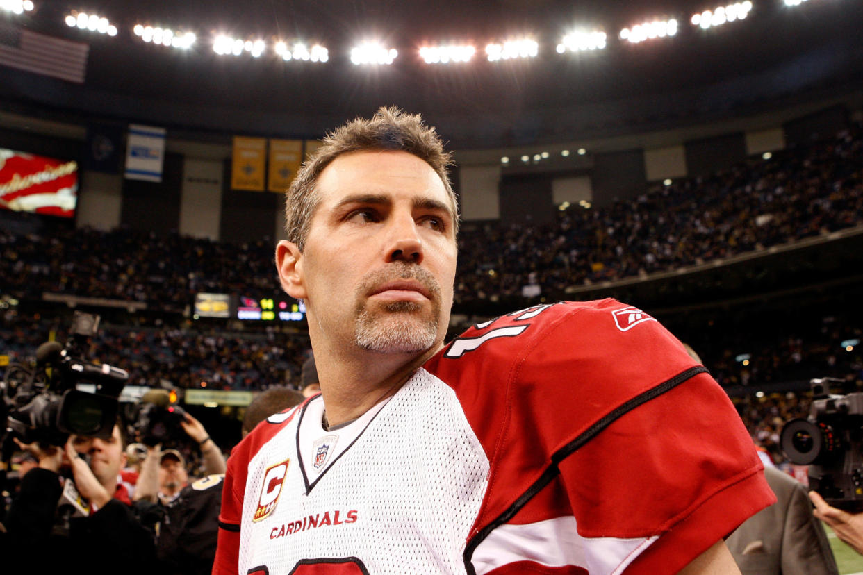 Kurt Warner leaving the field.