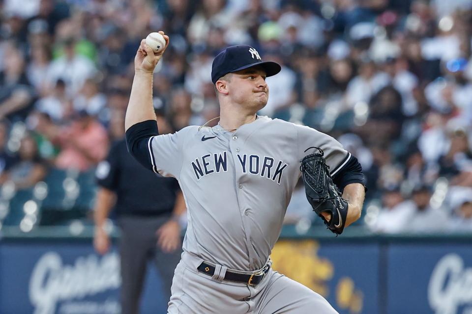 Aug 8, 2023; Chicago, Illinois, USA; New York Yankees starting pitcher Clarke Schmidt (36) delivers a pitch against the Chicago White Sox during the first inning at Guaranteed Rate Field. Mandatory Credit: Kamil Krzaczynski-USA TODAY Sports