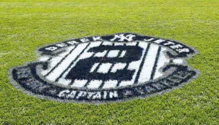 Sep 7, 2014; New York, NY, USA; A general view of a logo honoring New York Yankees shortstop Derek Jeter on the field before the game against the Kansas City Royals at Yankee Stadium. William Perlman/THE STAR-LEDGER via USA TODAY Sports