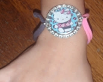 Hello Kitty Bottlecap Bracelets - $5