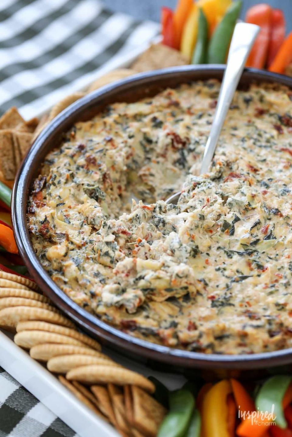 Slow Cooker Sun-Dried Tomato Spinach Artichoke Dip