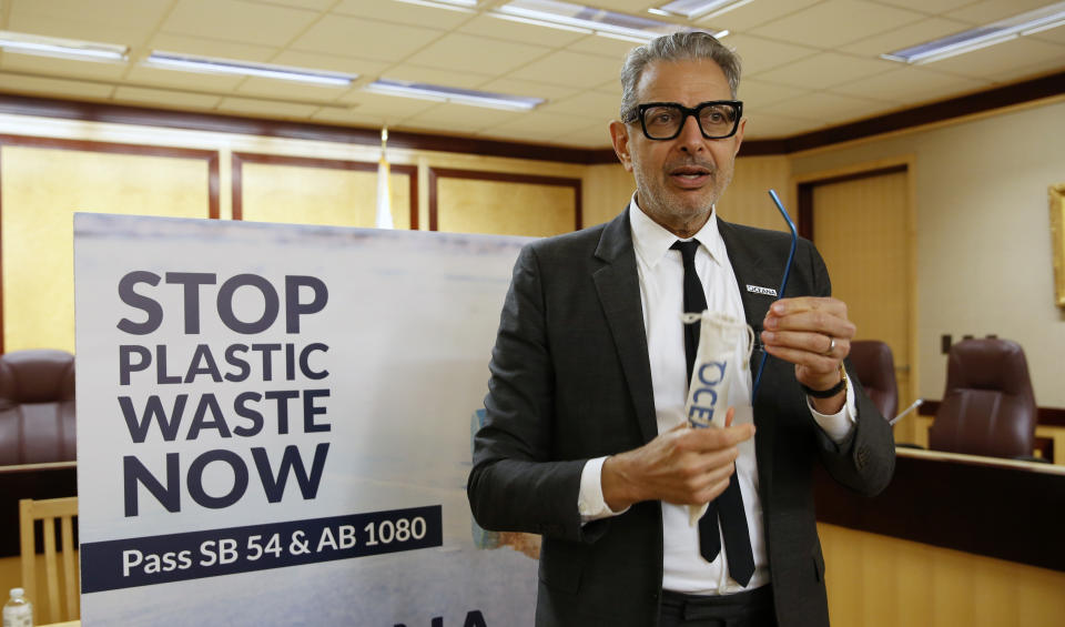 Actor Jeff Goldblum displays a reusable metal straw as he discusses two bills aimed at reducing single-use plastic packaging and products, like plastic straws and food containers at a Capitol news conference in Sacramento, Calif., Wednesday, Jan. 22, 2020. If approved by lawmakers and signed by the governor, California would become the first-in-the-nation to adopt measures to rein in waste for single-use plastic containers and items. (AP Photo/Rich Pedroncelli)