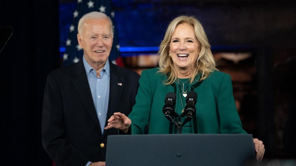 PHOTO: President Joe Biden listens as First Lady Dr. Jill Biden speaks at a campaign event at Pullman Yards, March 9, 2024, in Atlanta. (Megan Varner/Getty Images)