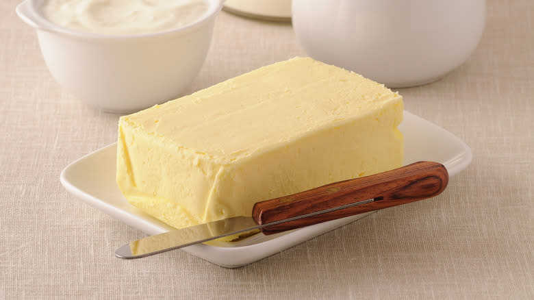 Block of butter and knife