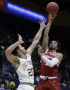 Stanford's Bryce Wills, right, shoots over California's Matt Bradley (20) in the first half of an NCAA college basketball game Sunday, Jan. 26, 2020, in Berkeley, Calif. (AP Photo/Ben Margot)