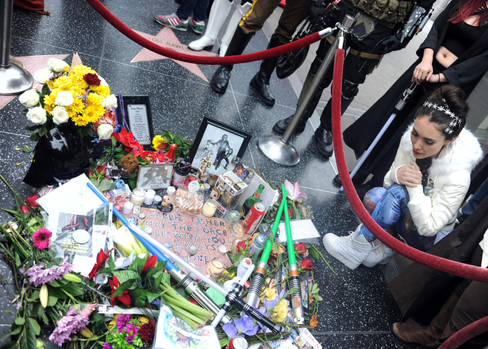 A makeshift tribute on Carrie Fisher’s star on the Walk of Fame after she passed away. Source: Getty Images.