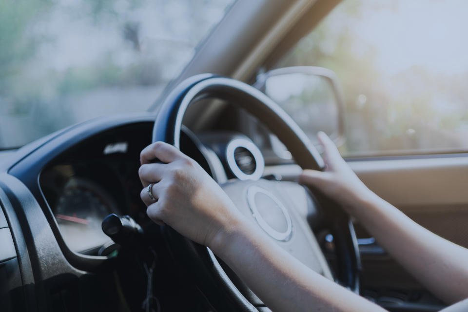 hands on the steering wheel