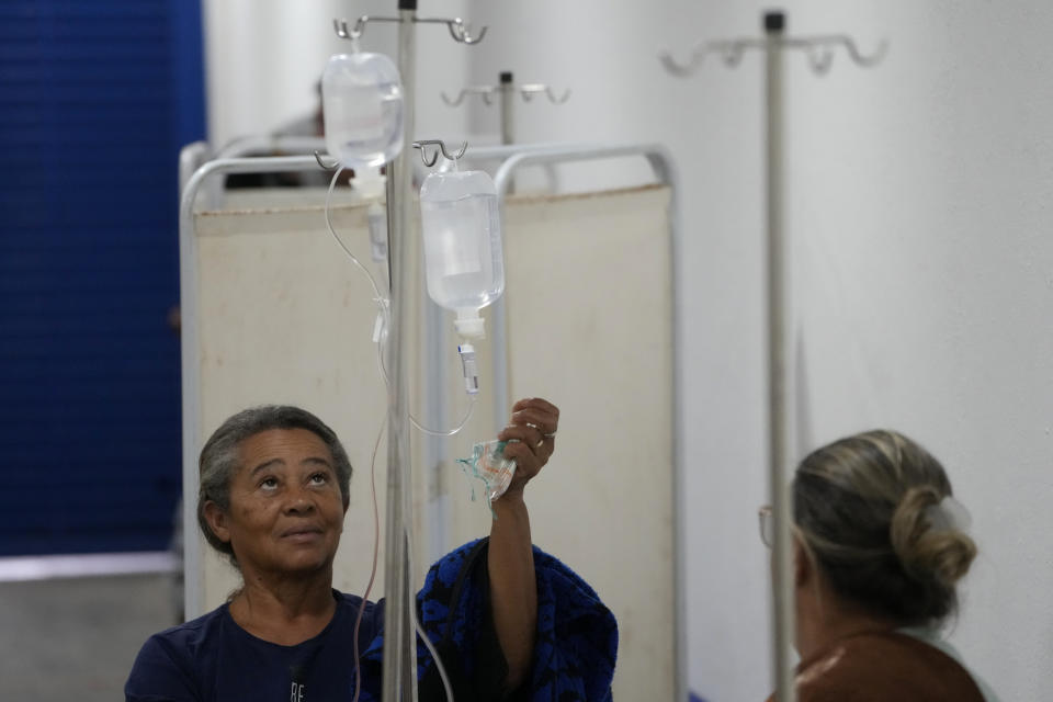 A dengue patient receives treatment in a provisional clinic in the Santa Maria neighborhood of Brasilia, Brazil, Tuesday, Jan. 23, 2024. (AP Photo/Eraldo Peres)