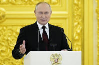 Russian President Vladimir Putin speaks during a ceremony to receive credentials from foreign ambassadors in Kremlin, in Moscow, Russia, Wednesday, Dec. 1, 2021. (Grigory Sysoev, Sputnik, Kremlin Pool Photo via AP)