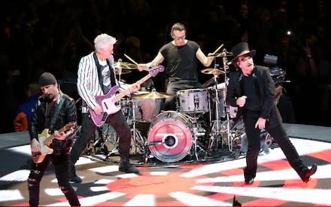 The Edge, Adam Clayton, Larry Mullen Jr and Bono of U2 on their 'Innocence and Experience Tour' at The O2 Arena - Credit: Simone Joyner/Getty Images Europe