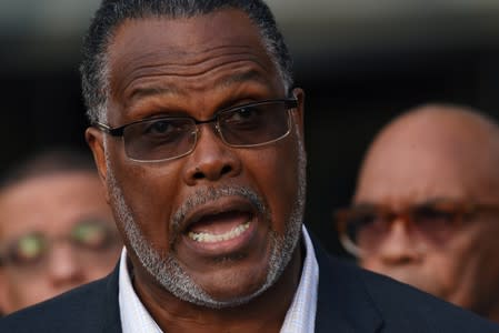 Minister Sammie Berry with the Dallas West Church of Christ speaks at the prayer vigil held outside the Frank Crowley Courts Building on the first day of the trial against former police officer Amber Guyger in Dallas