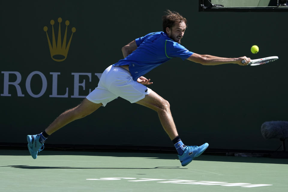 Daniil Medvedev, of Russia, returns a shot against Frances Tiafoe, of the United States, during a semifinal match at the BNP Paribas Open tennis tournament Saturday, March 18, 2023, in Indian Wells, Calif. (AP Photo/Mark J. Terrill)