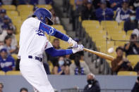 Los Angeles Dodgers' Cody Bellinger hits a solo home run during the eighth inning of a baseball game against the San Diego Padres Wednesday, Sept. 29, 2021, in Los Angeles. (AP Photo/Mark J. Terrill)