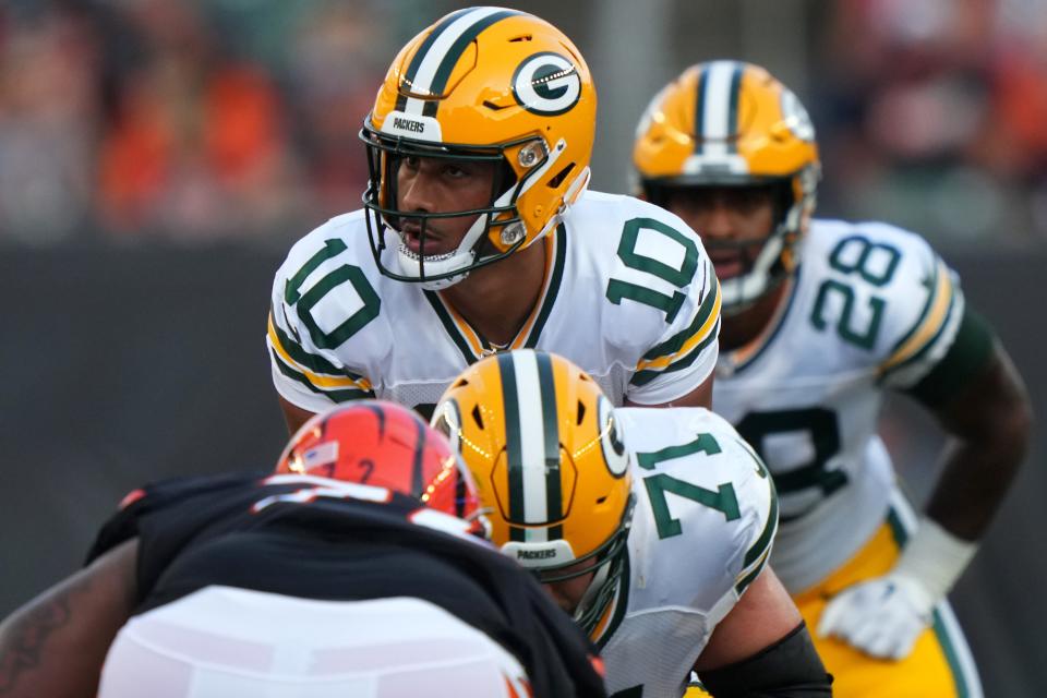 Green Bay Packers quarterback Jordan Love prepares for a snap in the first quarter against the Cincinnati Bengals.