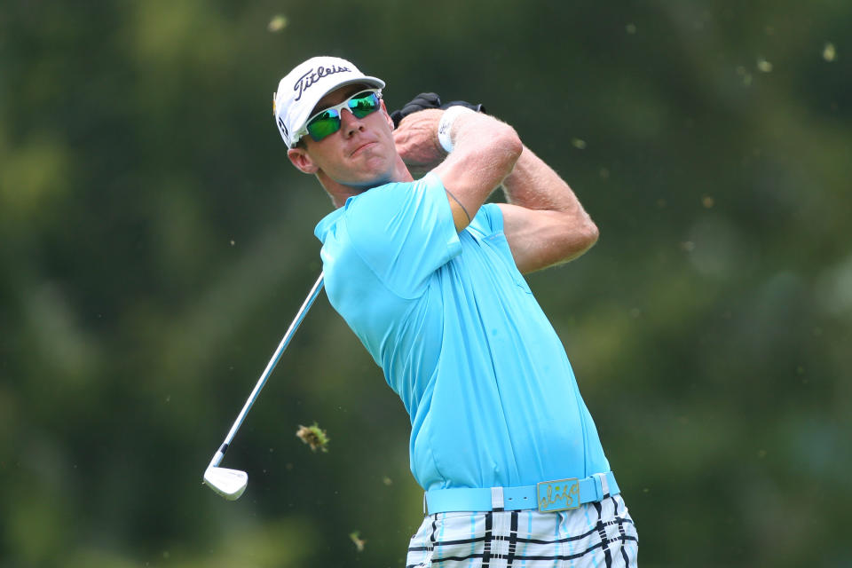 Graham DeLaet of Canada hits his tee shot on the third hole during the final round of the Greenbrier Classic at the Old White TPC on July 8, 2012 in White Sulphur Springs, West Virginia. (Photo by Hunter Martin/Getty Images)