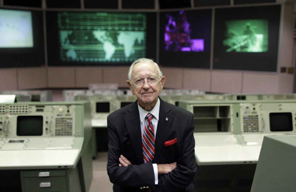 FILE - This Tuesday, July 5, 2011, file photo shows NASA Mission Control founder Chris Kraft in the old Mission Control at Johnson Space Center in Houston. Kraft, the founder of NASA's mission control, died Monday, July 22, 2019, just two days after the 50th anniversary of the Apollo 11 moon landing. He was 95. (AP Photo/David J. Phillip, File)