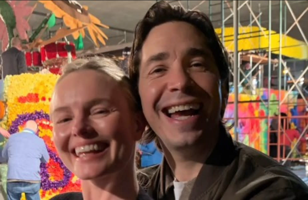 Justin Long spoke to their hypothetical children about writing 'soppy' posts about their mom online credit:Bang Showbiz