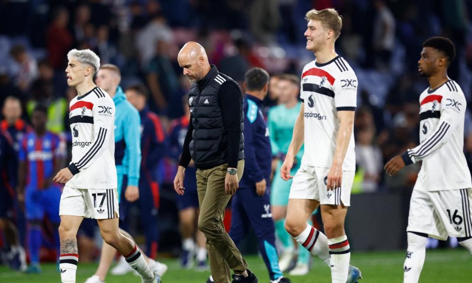 <span>Erik ten Hag leaves the field with his players after the 0-0 draw with Crystal Palace at Selhurst Park.</span><span>Photograph: Peter Cziborra/Action Images/Reuters</span>