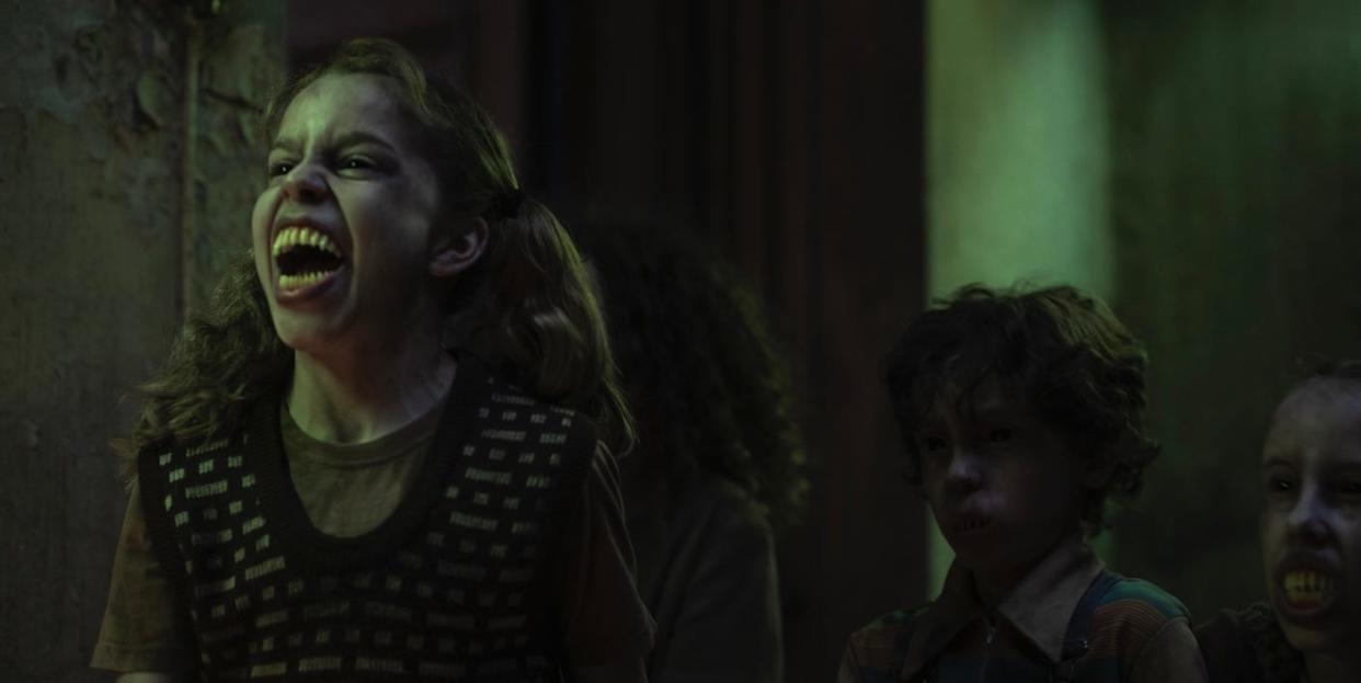 a picture of a scary girl with enlarged teeth from the movie bloodride by netflix