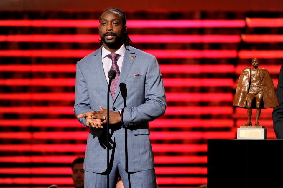 Charles Tillman of the Chicago Bears accepts the award for Walter Payton NFL Man of the Year at the third annual NFL Honors at Radio City Music Hall on Feb. 1, 2014, in New York.