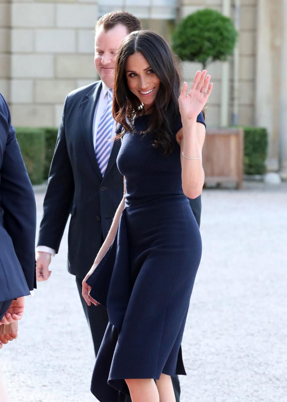 <p>As for Meghan, the <a href="https://www.cosmopolitan.com/entertainment/a20746787/meghan-markle-doria-ragland-royal-wedding-rehearsal/" rel="nofollow noopener" target="_blank" data-ylk="slk:night before her wedding;elm:context_link;itc:0;sec:content-canvas" class="link ">night before her wedding</a> she opted for a similar navy dress. Classic.</p>