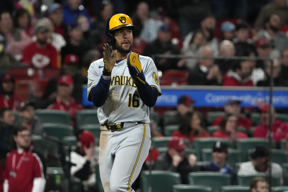 Milwaukee Brewers' Blake Perkins celebrates after scoring during the 10th inning of a baseball game against the St. Louis Cardinals Friday, April 19, 2024, in St. Louis. (AP Photo/Jeff Roberson)