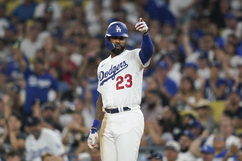 Los Angeles Dodgers' Jason Heyward gestures after hitting a single against the Arizona Diamondbacks during the fifth inning of a baseball game Tuesday, Aug. 29, 2023, in Los Angeles. (AP Photo/Ryan Sun)