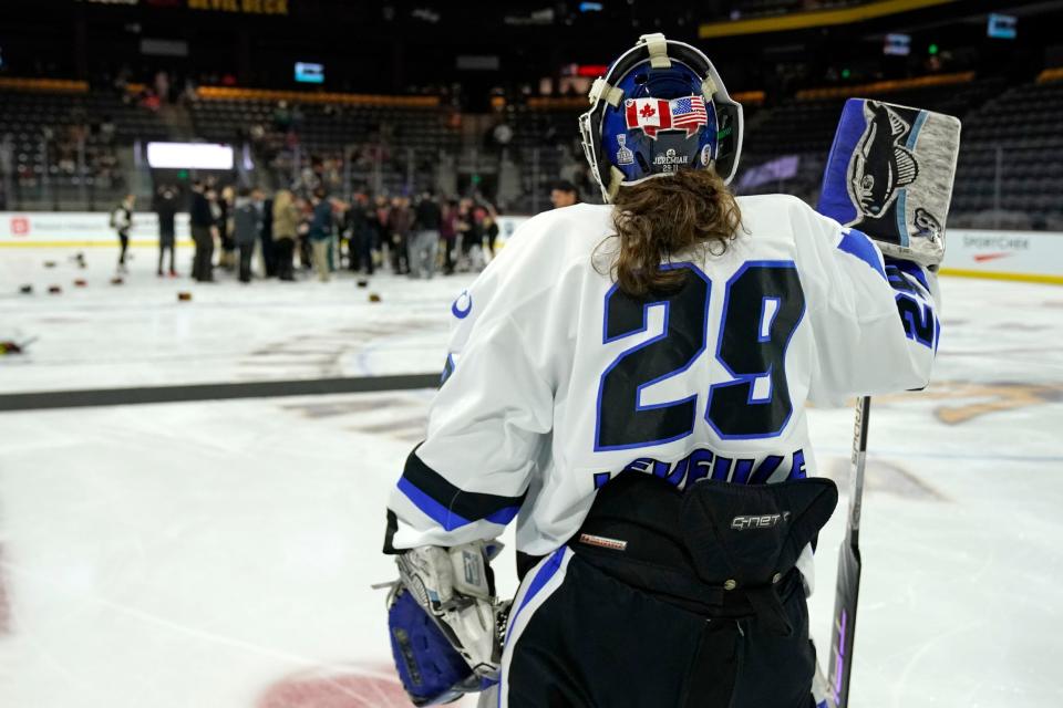 Minnesota Whitecaps goalie Amanda Leveille looks on as the Toronto Six celebrate winning the 2023 Isobel Cup.