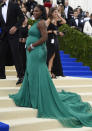 FILE - Serena Williams attends The Metropolitan Museum of Art's Costume Institute benefit gala celebrating the opening of the Rei Kawakubo/Comme des Garçons: Art of the In-Between exhibition on Monday, May 1, 2017, in New York. Serena Williams says she is ready to step away from tennis after winning 23 Grand Slam titles, turning her focus to having another child and her business interests. “I’m turning 41 this month, and something’s got to give,” Williams wrote in an essay released Tuesday, Aug. 9, 2022, by Vogue magazine.(Photo by Evan Agostini/Invision/AP, File)