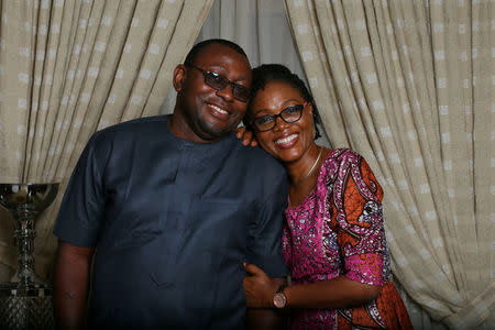 Oladipupo Baruwa, 45, an investment promotion officer and Funke Baruwa, 43, a gender and development expert, pose for a photograph at home in Abuja, Nigeria, February 9, 2018. "Well, he is persistent. We met at a church on the first Sunday service of the year 2000 and he followed me home after every service from that day on until about two years later. I just loved his persistence and the fact that he didn't want to give up," said Funke. After the birth of their first daughter in 2013 the pair made a commitment that, whatever lay ahead, they would face it together. "For me that has always been the unifyingÊ factor... Marriage is a commitment, it is a hard work and when you are willing to work at it, you get better,"ÊBaruwa said. REUTERS/Afolabi Sotunde