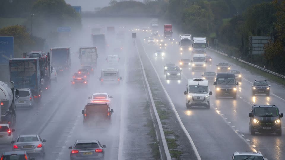 Spray and winds pound the M5 motorway network in Somerset, England. - Ben Birchall/AP