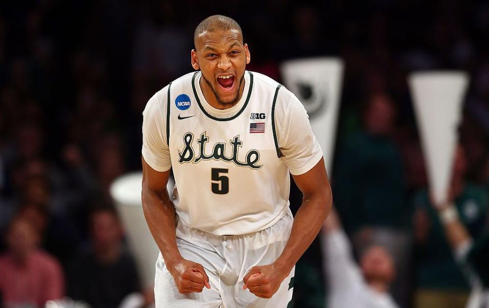 NEW YORK, NY - MARCH 30:  Adreian Payne #5 of the Michigan State Spartans reacts after a basket in the second half against the Connecticut Huskies during the East Regional Final of the 2014 NCAA Men's Basketball Tournament at Madison Square Garden on March 30, 2014 in New York City.  (Photo by Elsa/Getty Images)