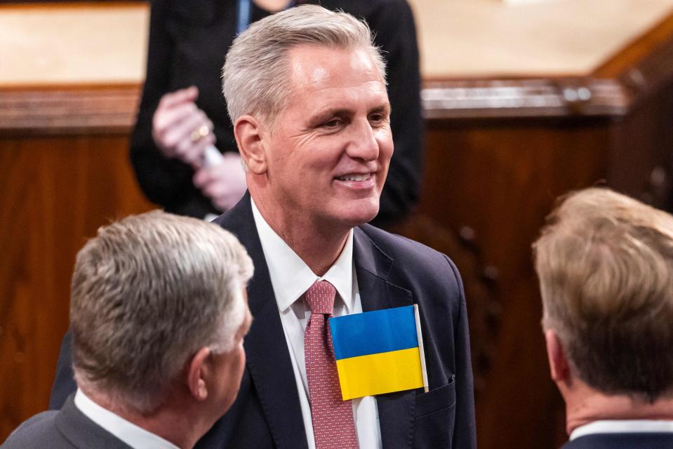 House Minority Leader Kevin McCarthy wears a Ukranian flag before US President Joe Biden delivers his first State of the Union address at the US Capitol in Washington, DC, on March 1, 2022. 