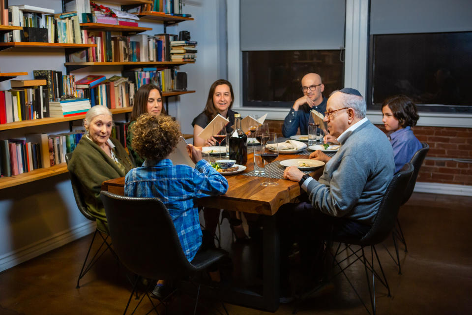 A modern Jewish American family celebrates Passover together. The youngest person at the seder, a little boy, is asking the Four Questions (Mah Nishtanah). These questions provide the impetus for telling why this night is different from all other nights.