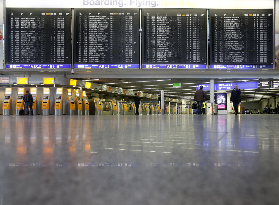 A terminal is almost empty as public employees of the Frankfurt airport went on a warning strike for higher wages in Frankfurt, Germany, Thursday, March 27, 2014. Lufthansa had to cancel more than 600 flights. (AP Photo/Michael Probst)