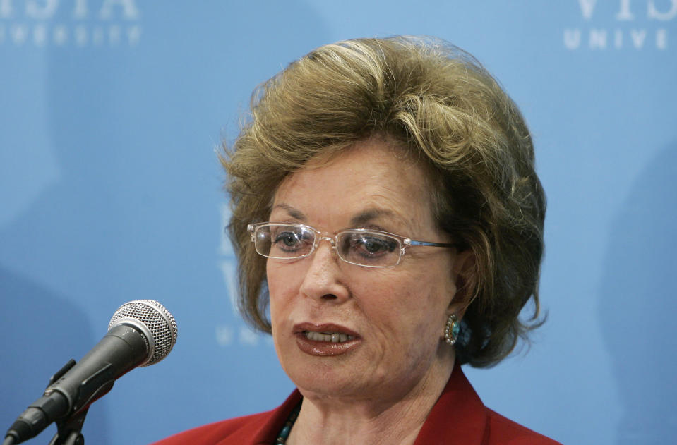 FILE - In this Sept. 29, 2006, file photo, Jehan Sadat, widow of former Egypt president Anwar Sadat, speaks at a news conference before speaking during the William Siebens American Heritage lecture series at Buena Vista University in Storm Lake, Iowa. Jehan Sadat died in Cairo on Friday, July 9, 2021, at the age of 87, Egypt’s President’s office said. (AP Photo/Charlie Neibergall, File)